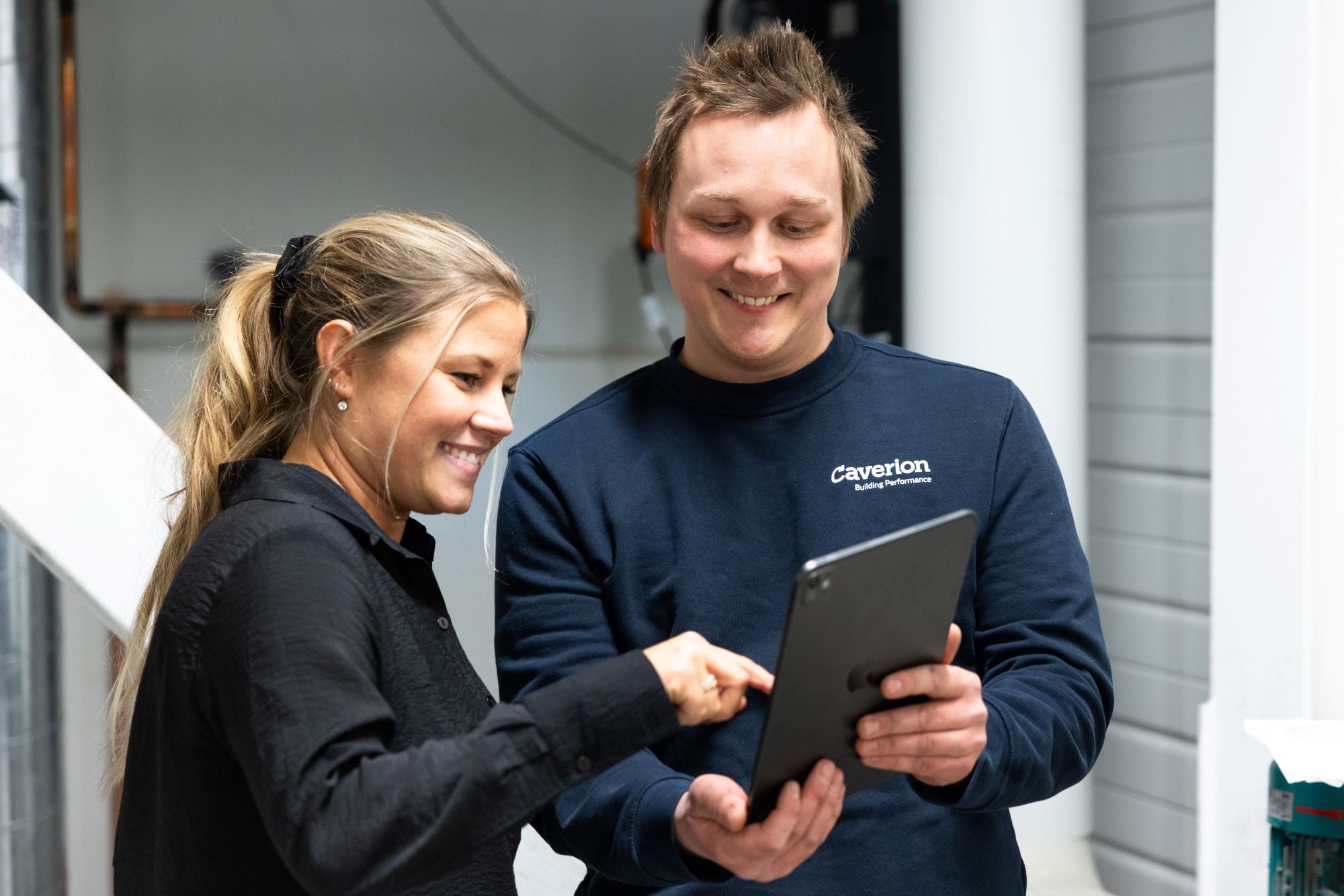 service-workers-looking-at-phone.jpg
